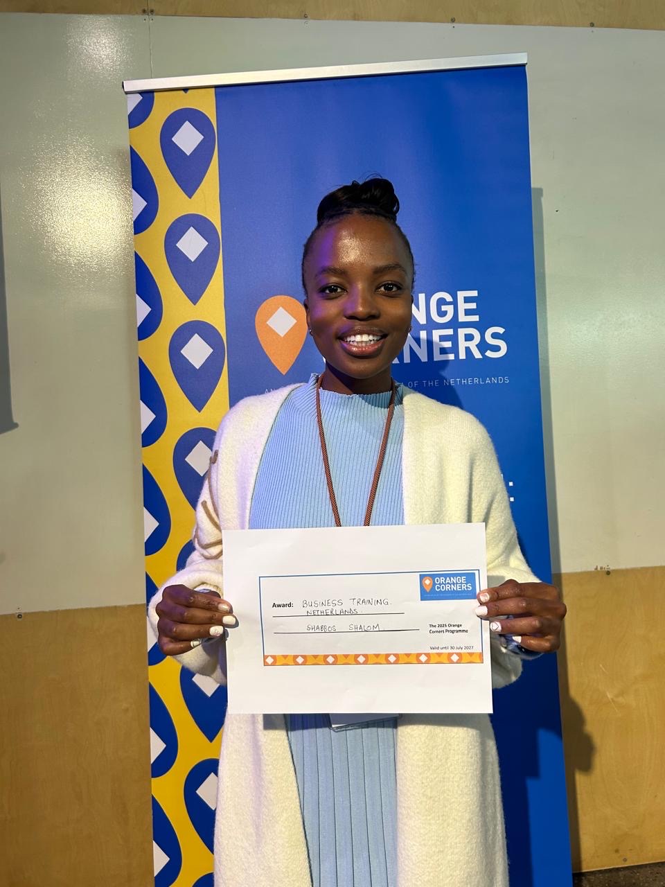 Nthabiseng holds the Orange Corners award for Business Training in the Netherlands